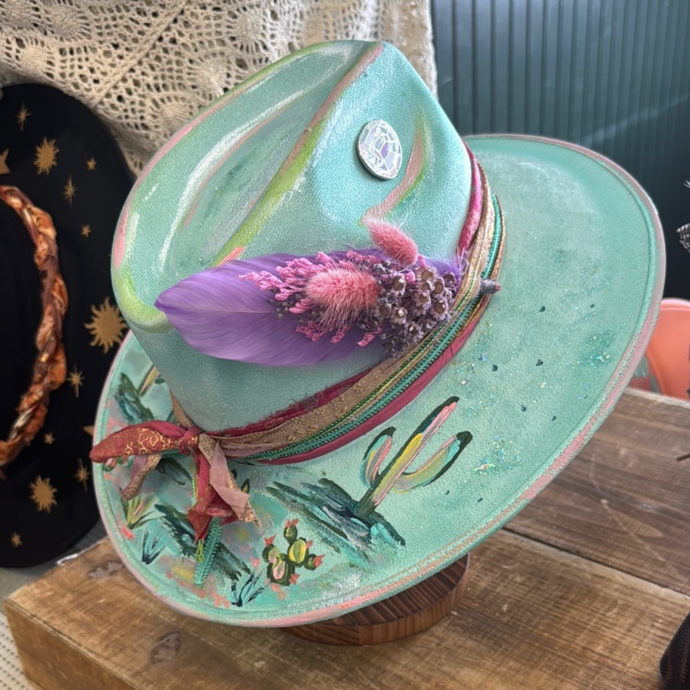 Artistic Green Hat with Purple Feather